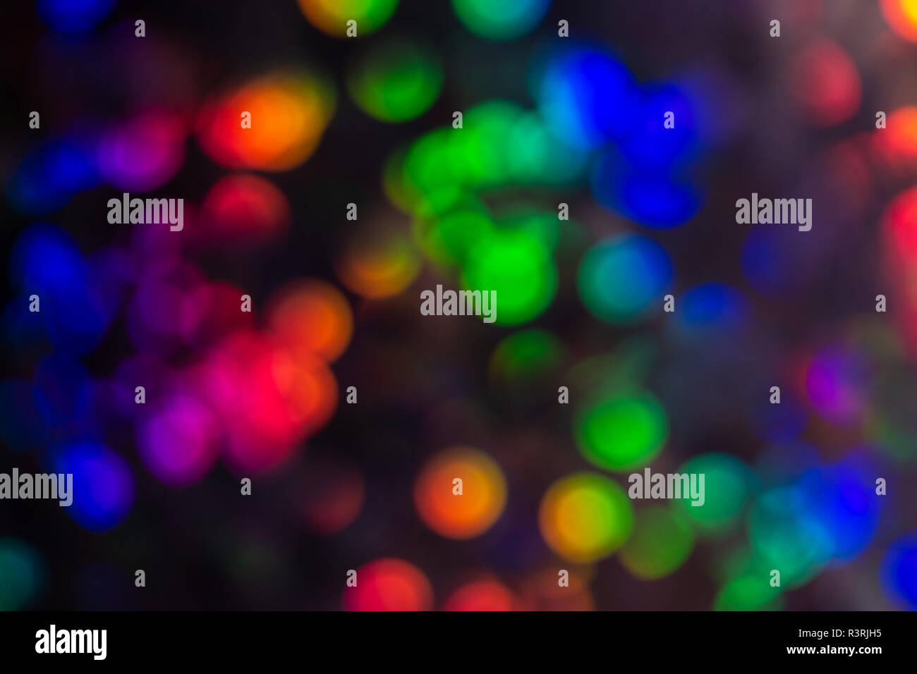 Mulicoloured contrasting sequined bokeh effect Stock Photo