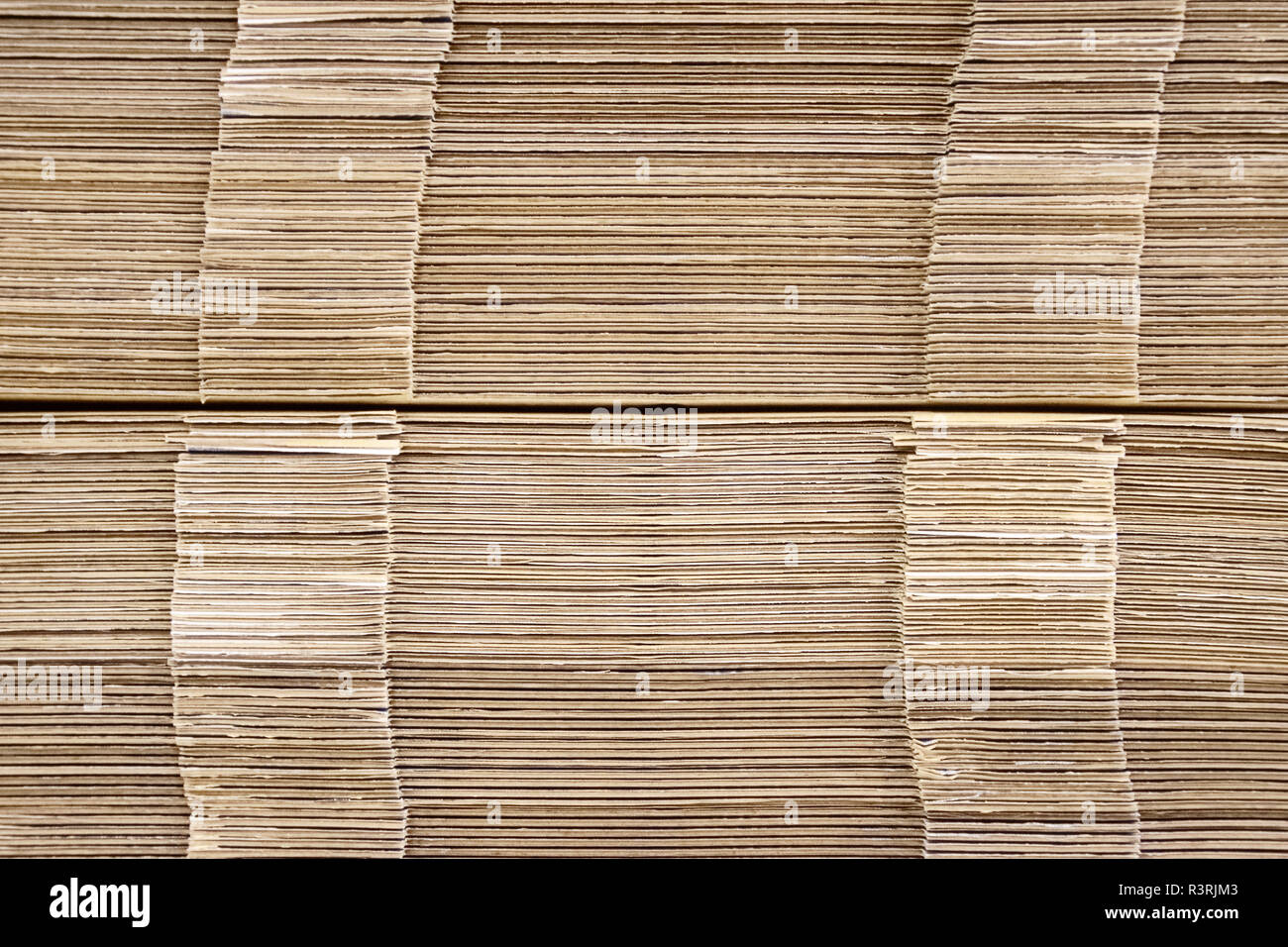 Ream of cardboard put one on another paper Stock Photo - Alamy