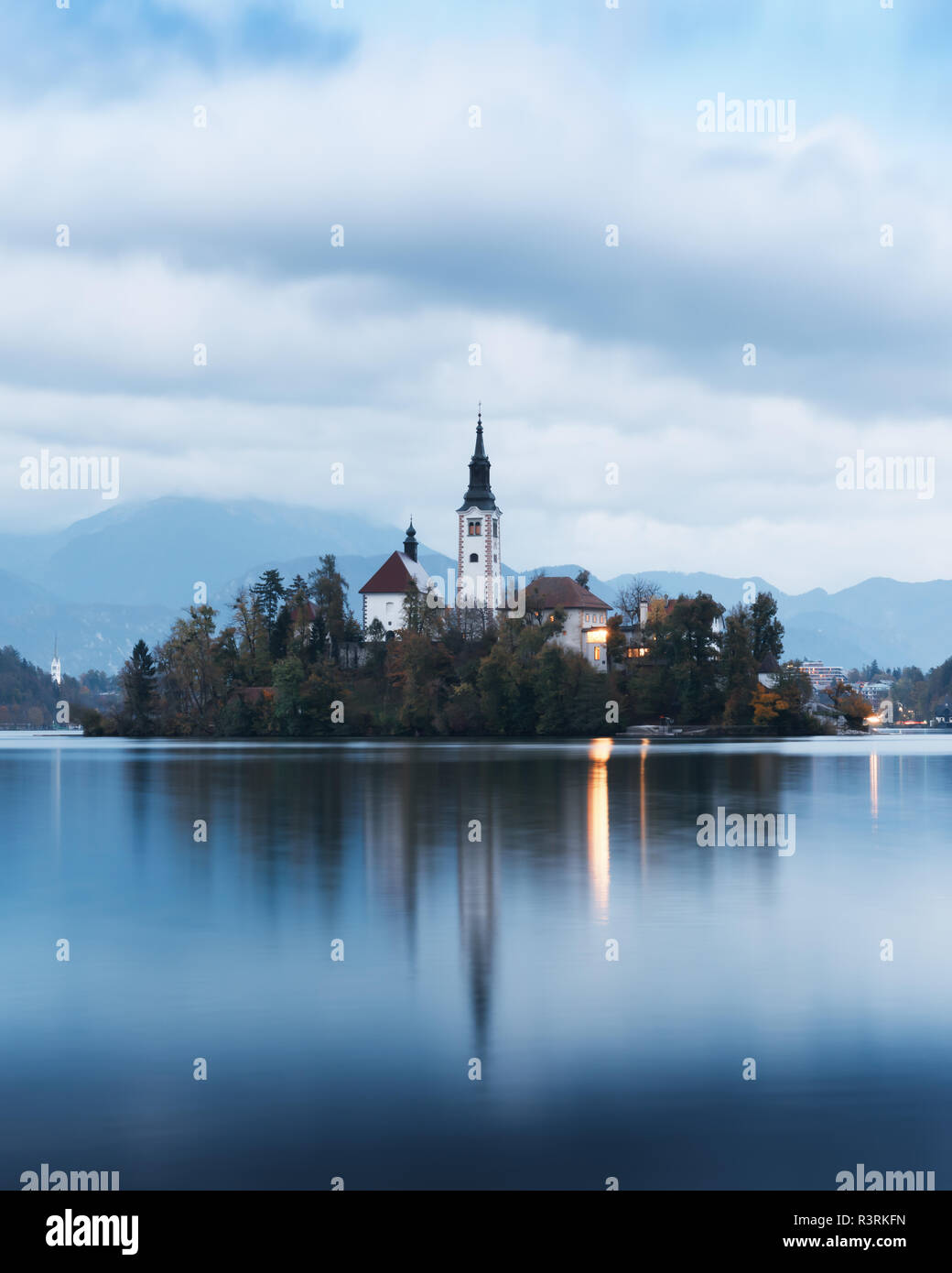 Evening autumn view of Bled lake in Julian Alps, Slovenia. Pilgrimage church of the Assumption of Maria on a foreground. Landscape photography Stock Photo