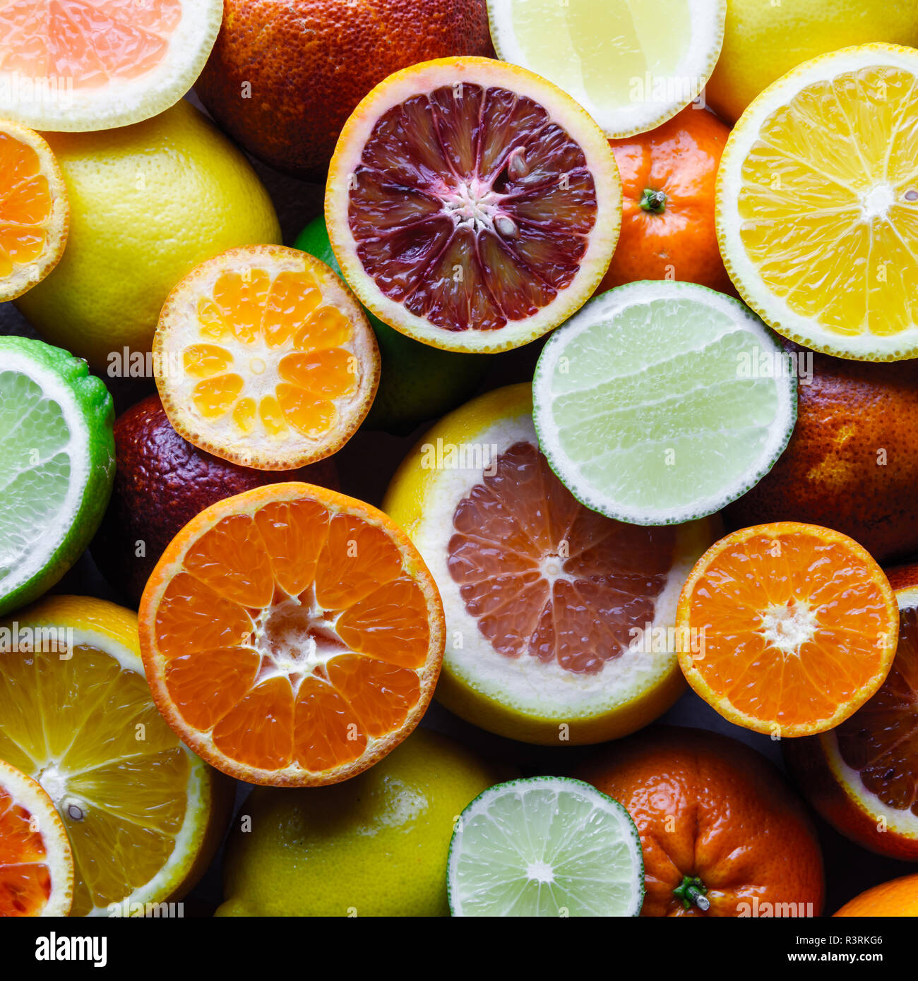 Mix of different citrus fruits closeup. Healthy diet vitamin concept. Food photography Stock Photo