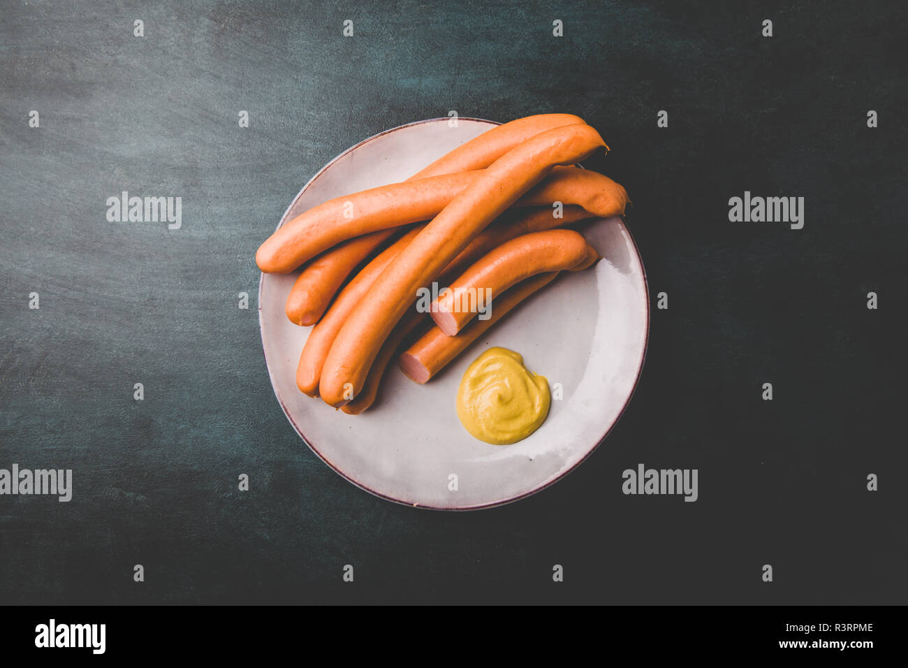 Vienna sausages with mustard Stock Photo