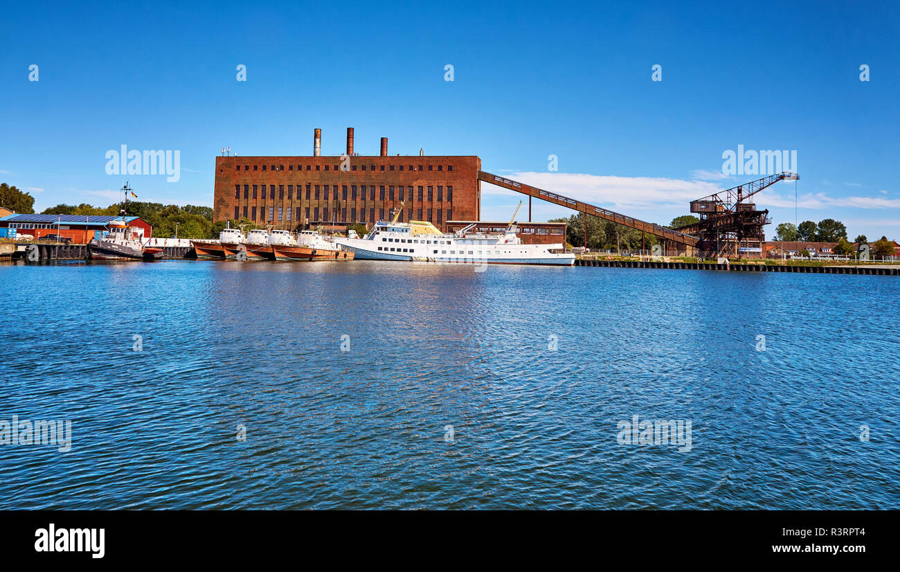 Port of Peenemünde with patrol boats and a large military boat. Stock Photo