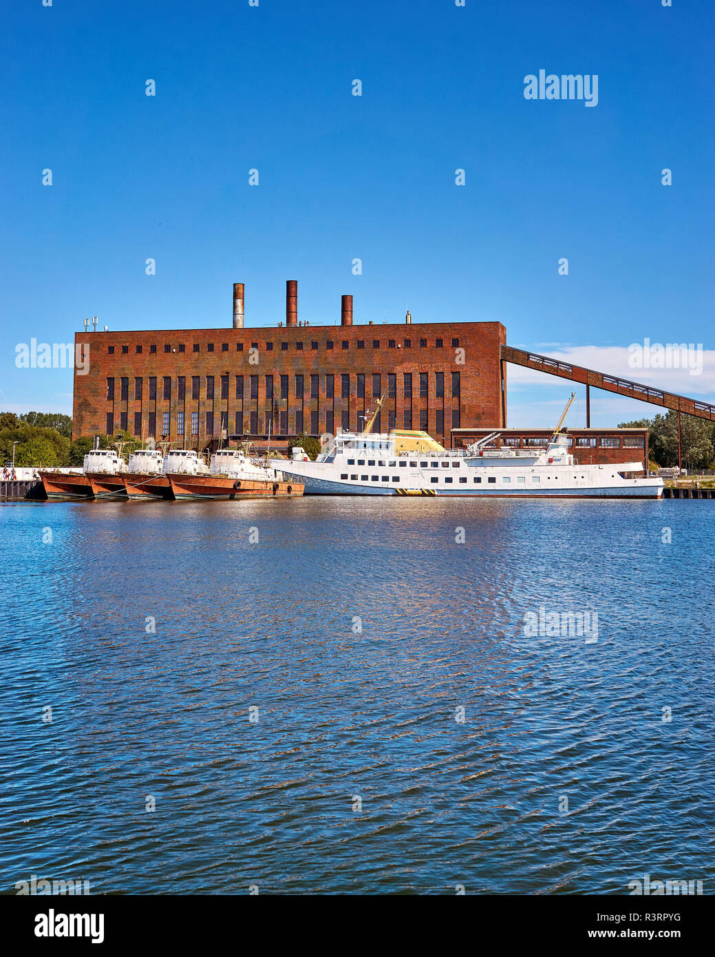 Patrol boats and large military boat in the harbor of Peenemünde. Stock Photo