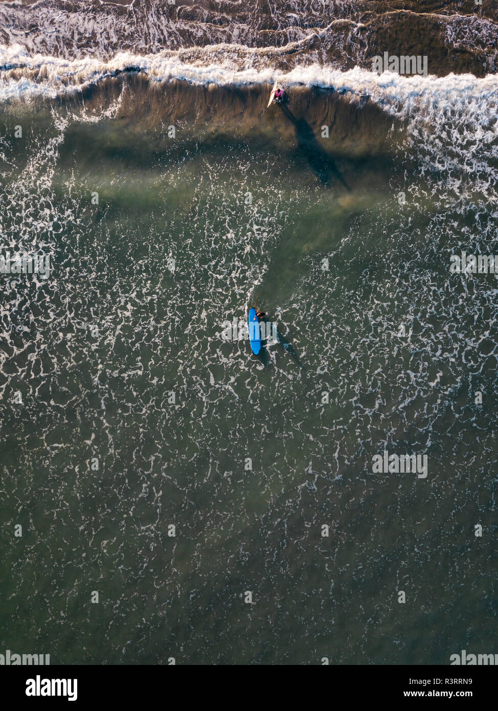 Aerial top view two surfers hi-res stock photography and images - Alamy