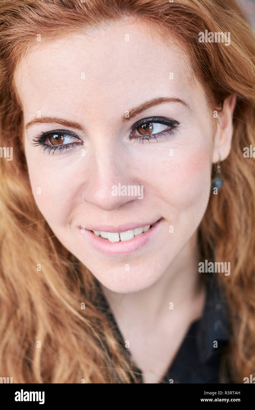 Portrait of redheaded Mid adult woman Stock Photo
