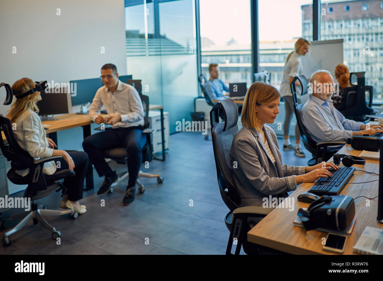 Colleagues working in office Stock Photo