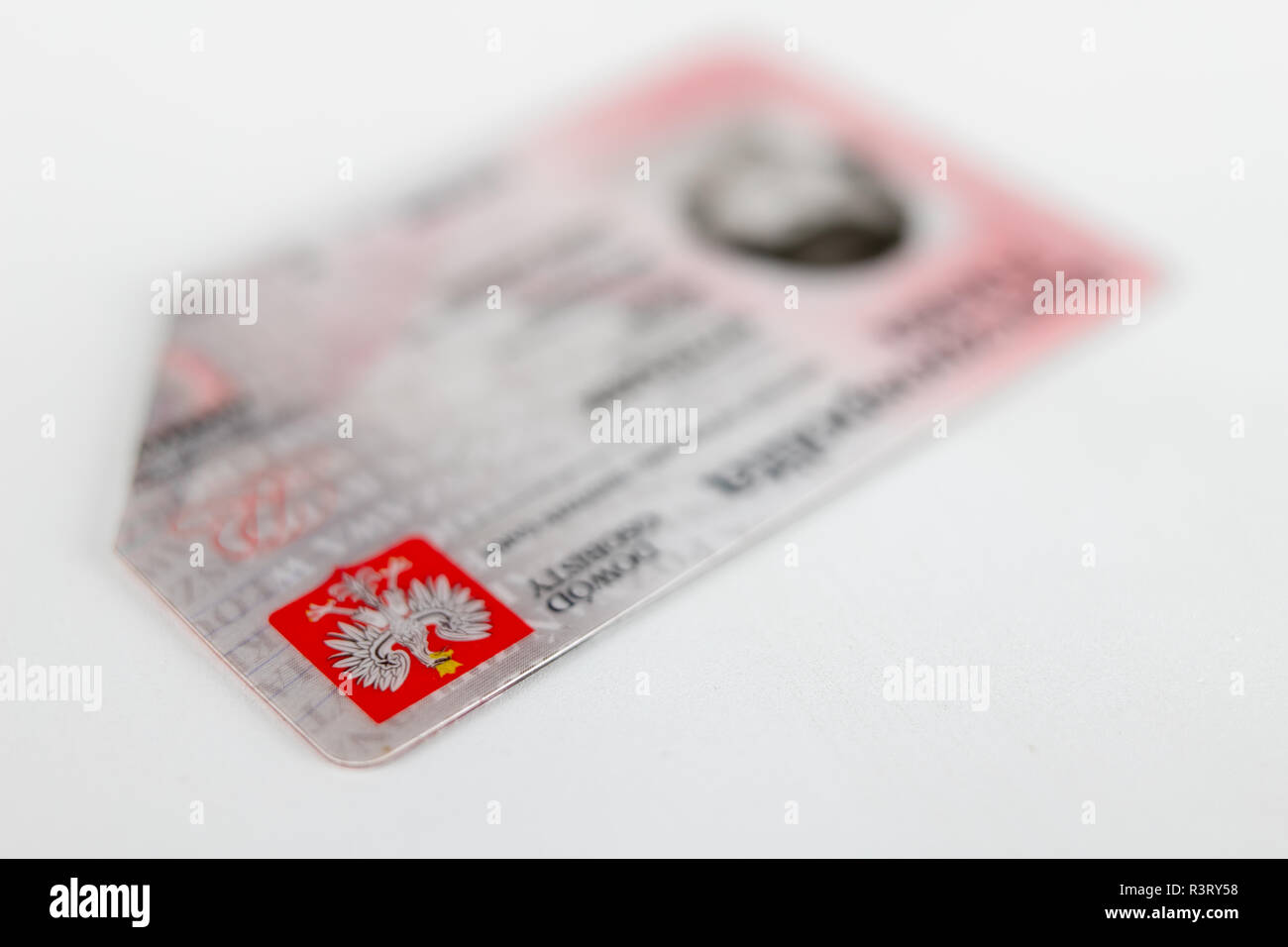 Polish ID card on a white table. An identification document with Polish