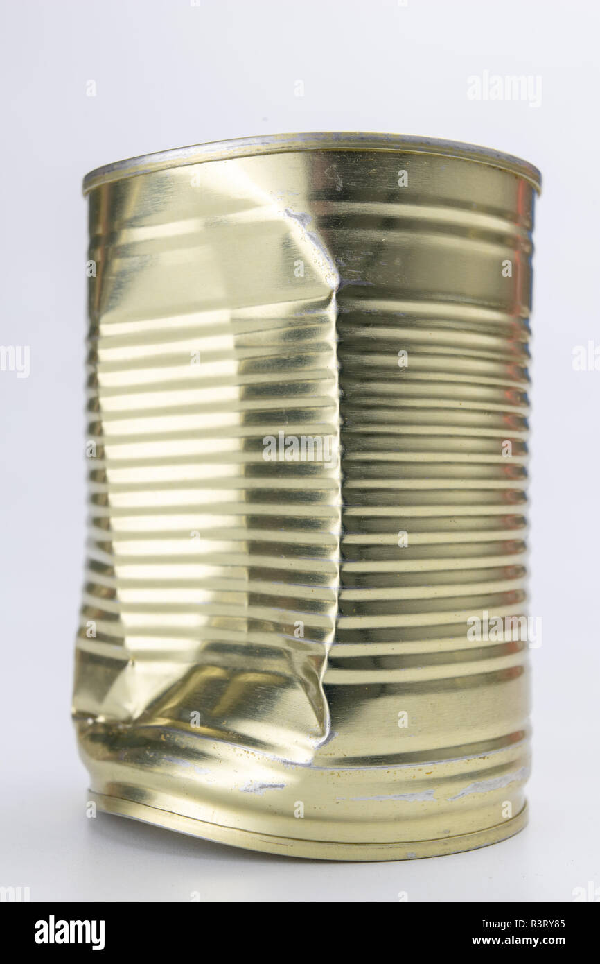 Can with meat dish on a white table. Canned food with a long shelf life