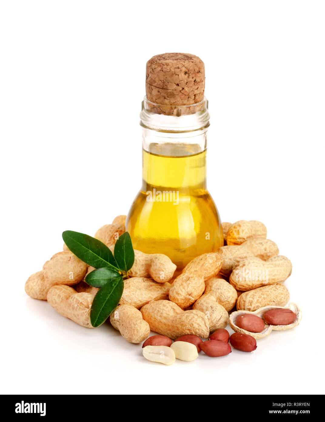 peanut oil in a glass bottle with peanuts Stock Photo Alamy