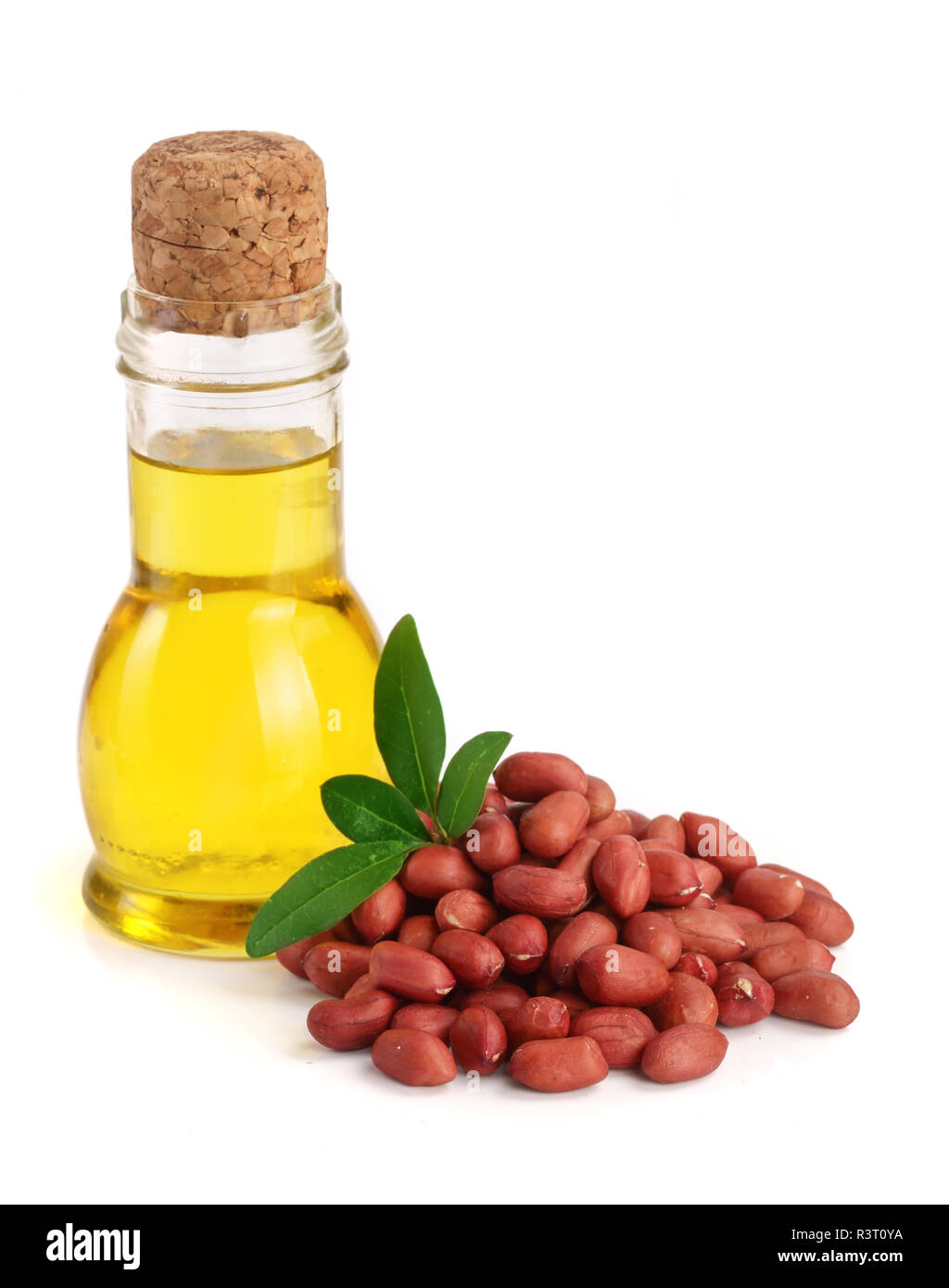 peanut oil in a glass bottle with peanuts Stock Photo Alamy