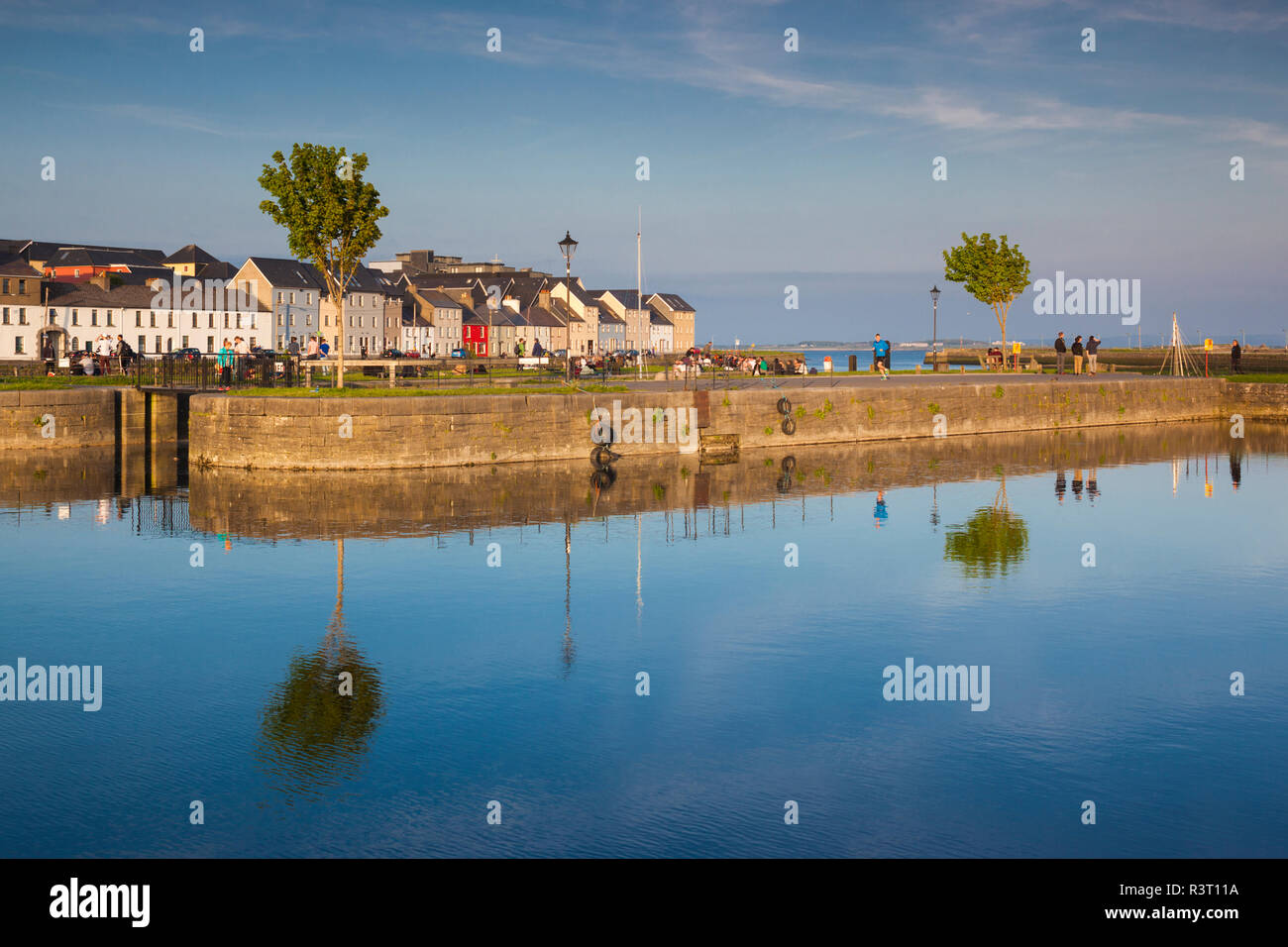 Ireland, County Galway, Galway City, River Corrib reflection at the Canal Basin, dusk Stock Photo