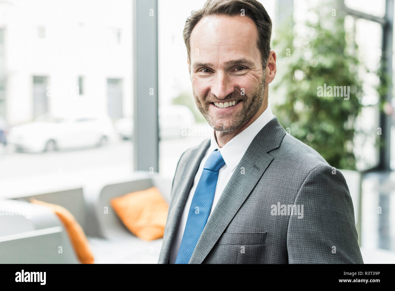 Portrait of smiling businessman Stock Photo