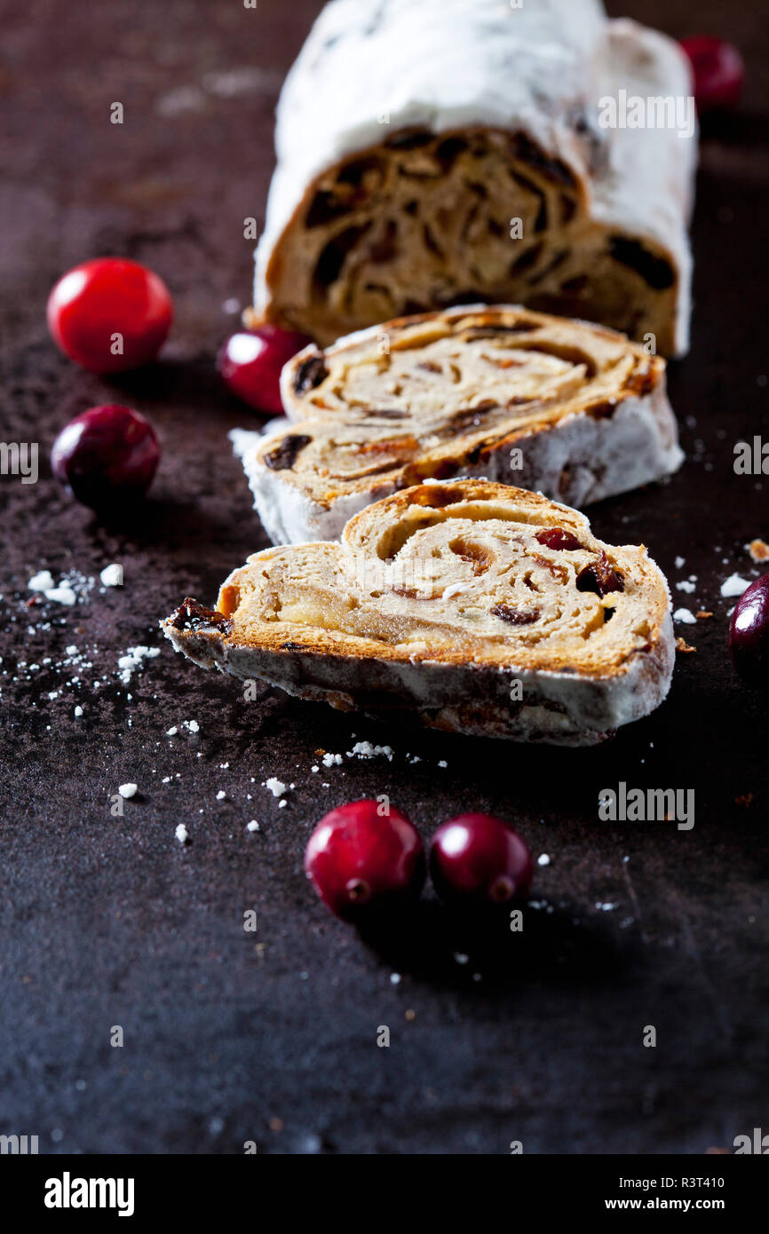 Sliced Christmas Stollen with icing sugar Stock Photo