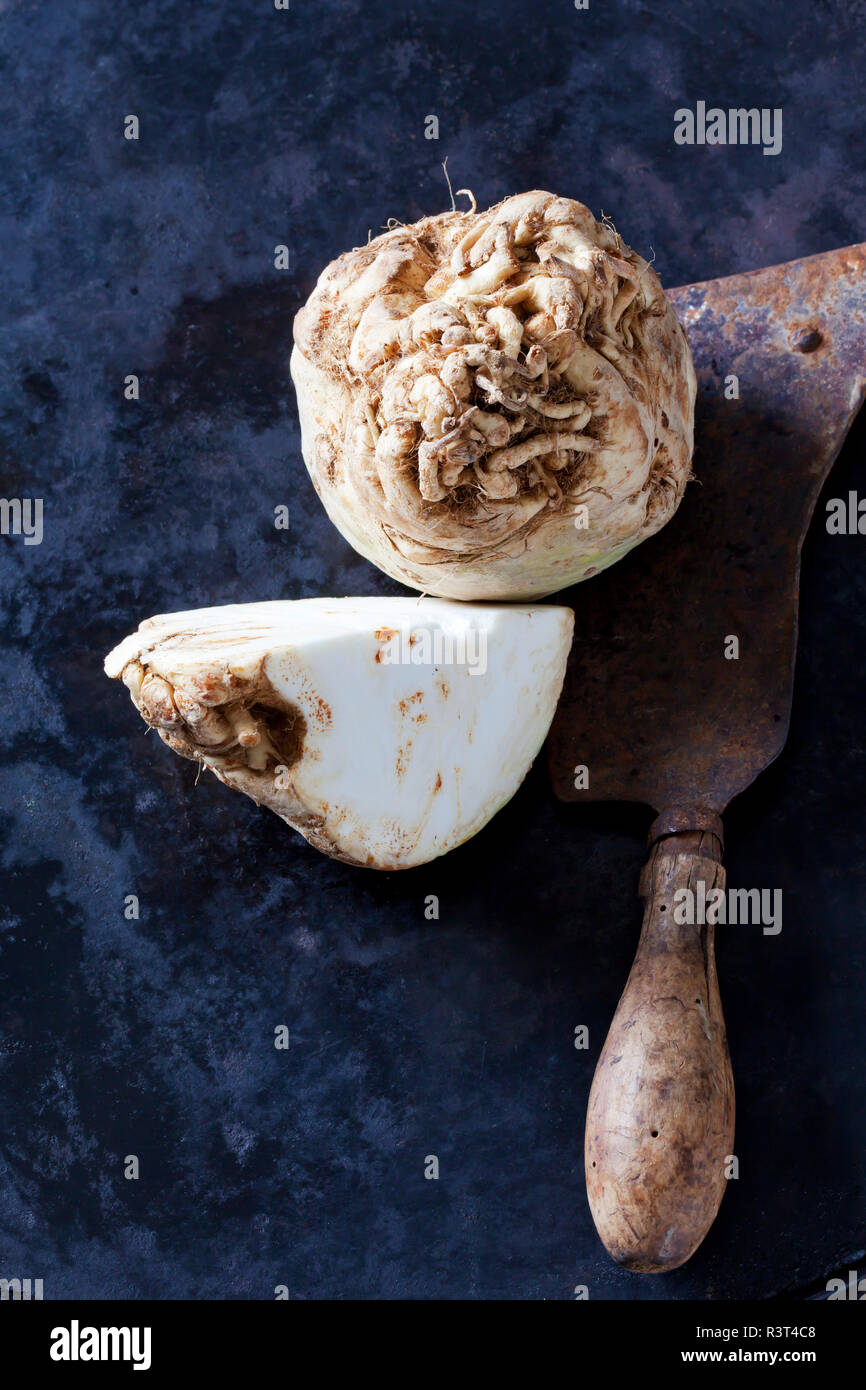 Celeriac and old cleaver Stock Photo