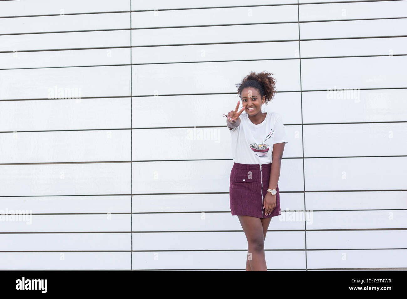 Pretty young woman hand sign hi-res stock photography and images - Alamy