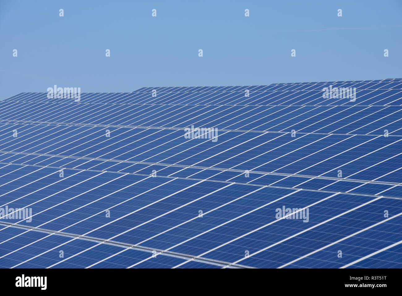 Germany, View of large number of solar panels at solar plant field Stock Photo