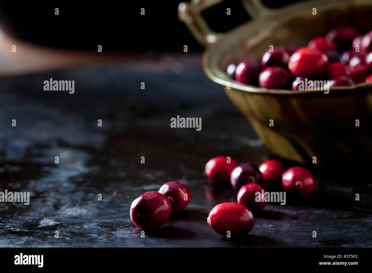 Cranberries in a bowl Stock Photo