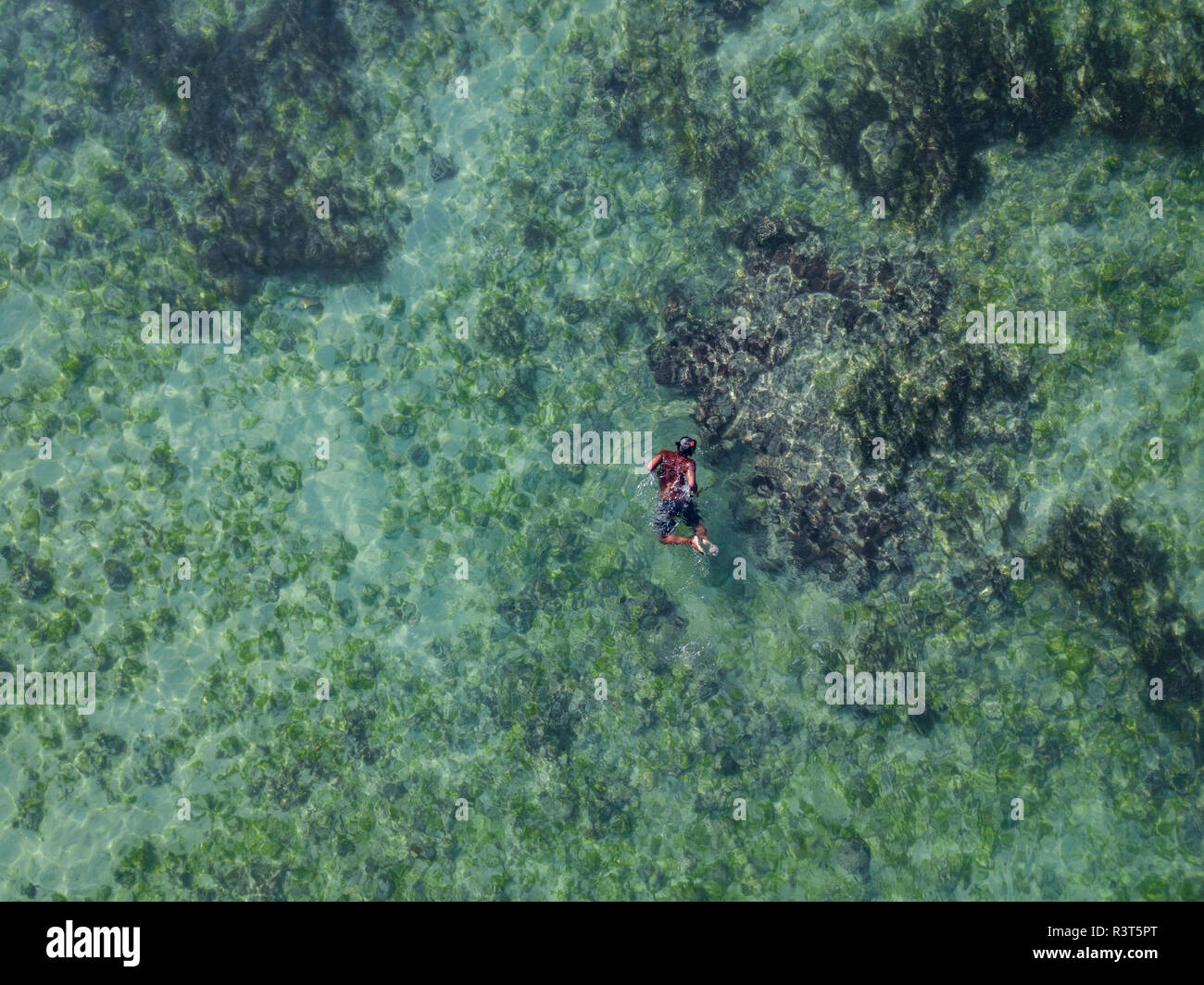 Indonesia, Bali, Aerial view of snorkeler Stock Photo