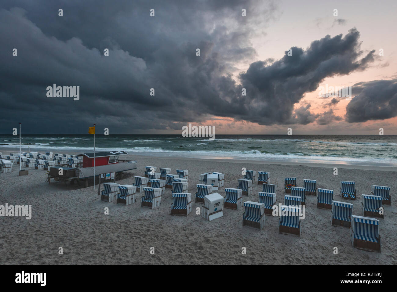 Germany, Schleswig-Holstein, Sylt, Kampen, rain clouds above the beach Stock Photo