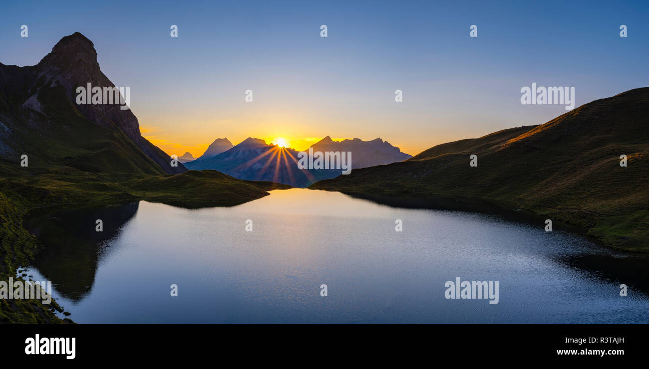 Germany, Bavaria, Allgaeu, Allgaeu Alps, Lake Rappensee, Kleiner Rappenkopf at sunset Stock Photo