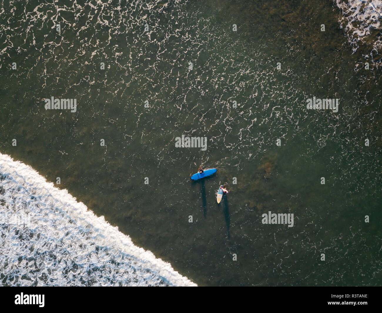 Aerial top view two surfers hi-res stock photography and images - Alamy