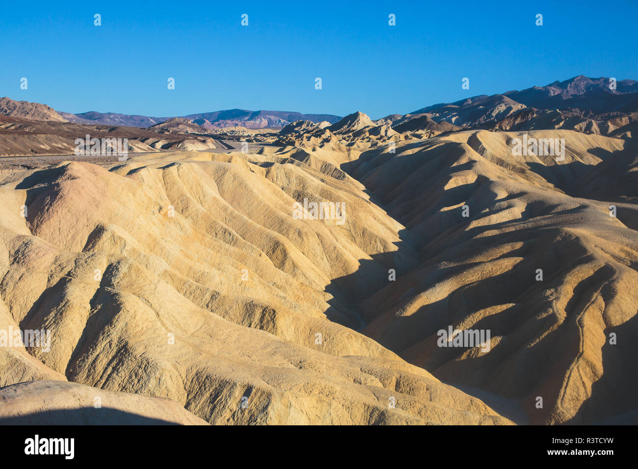 Vibrant panoramic summer view of Zabriskie point badlands in Death Valley National Park, Death Valley, Inyo County, California, USA Stock Photo