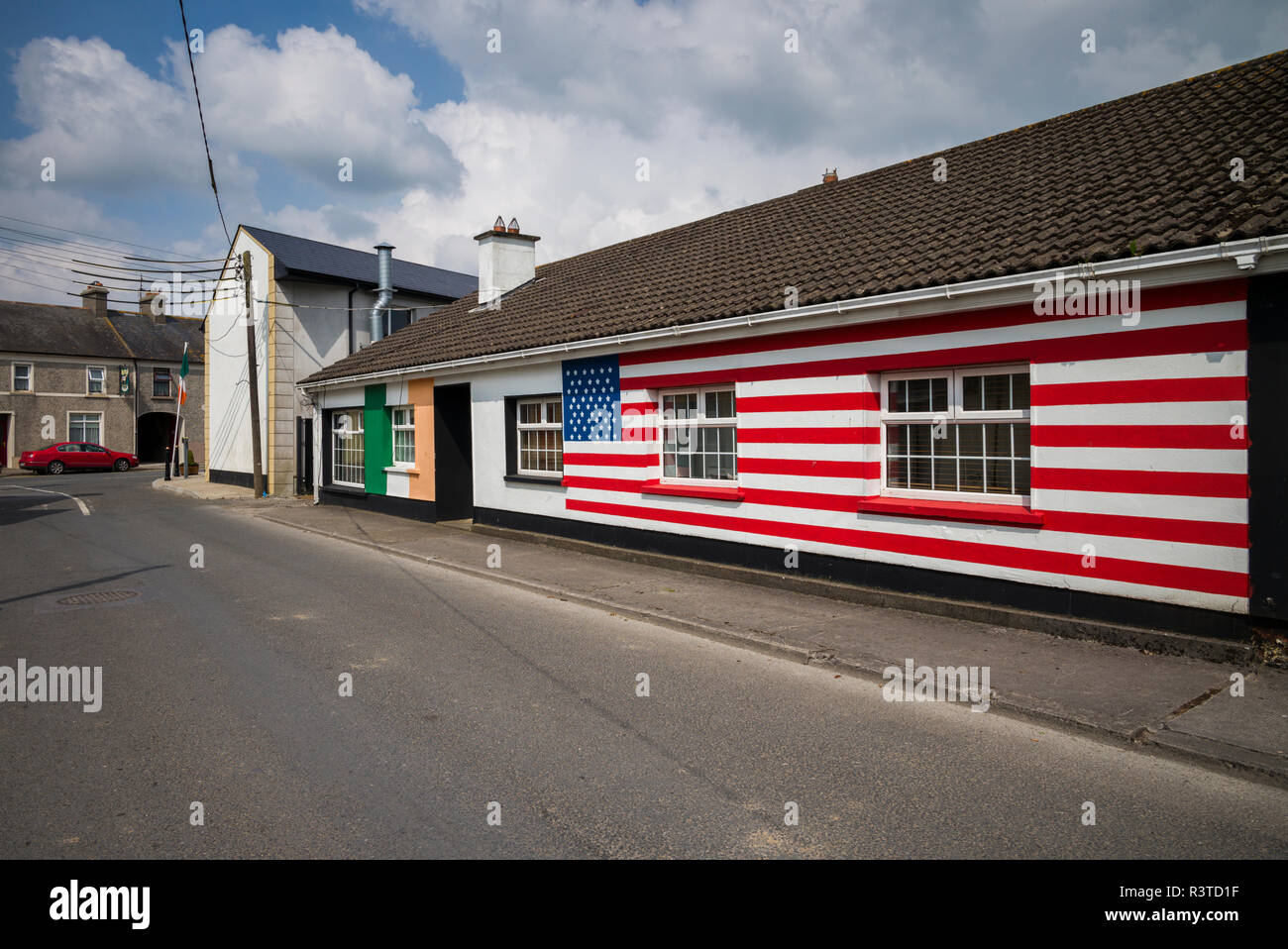 Ireland, County Offaly, Moneygall, house painted with US flags for visit by US President Barack Obama Stock Photo