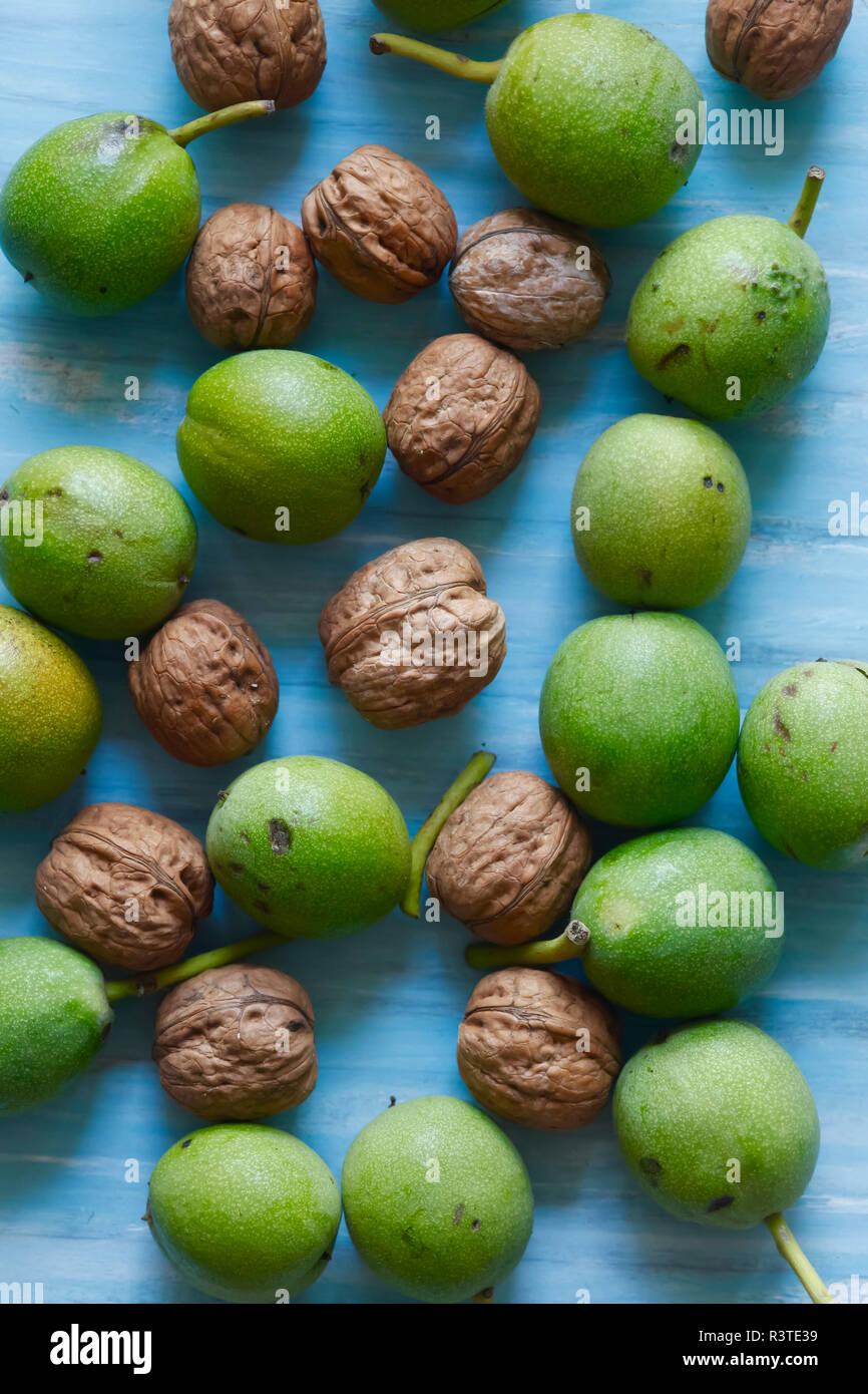 Peeled and unpeeled walnuts Stock Photo