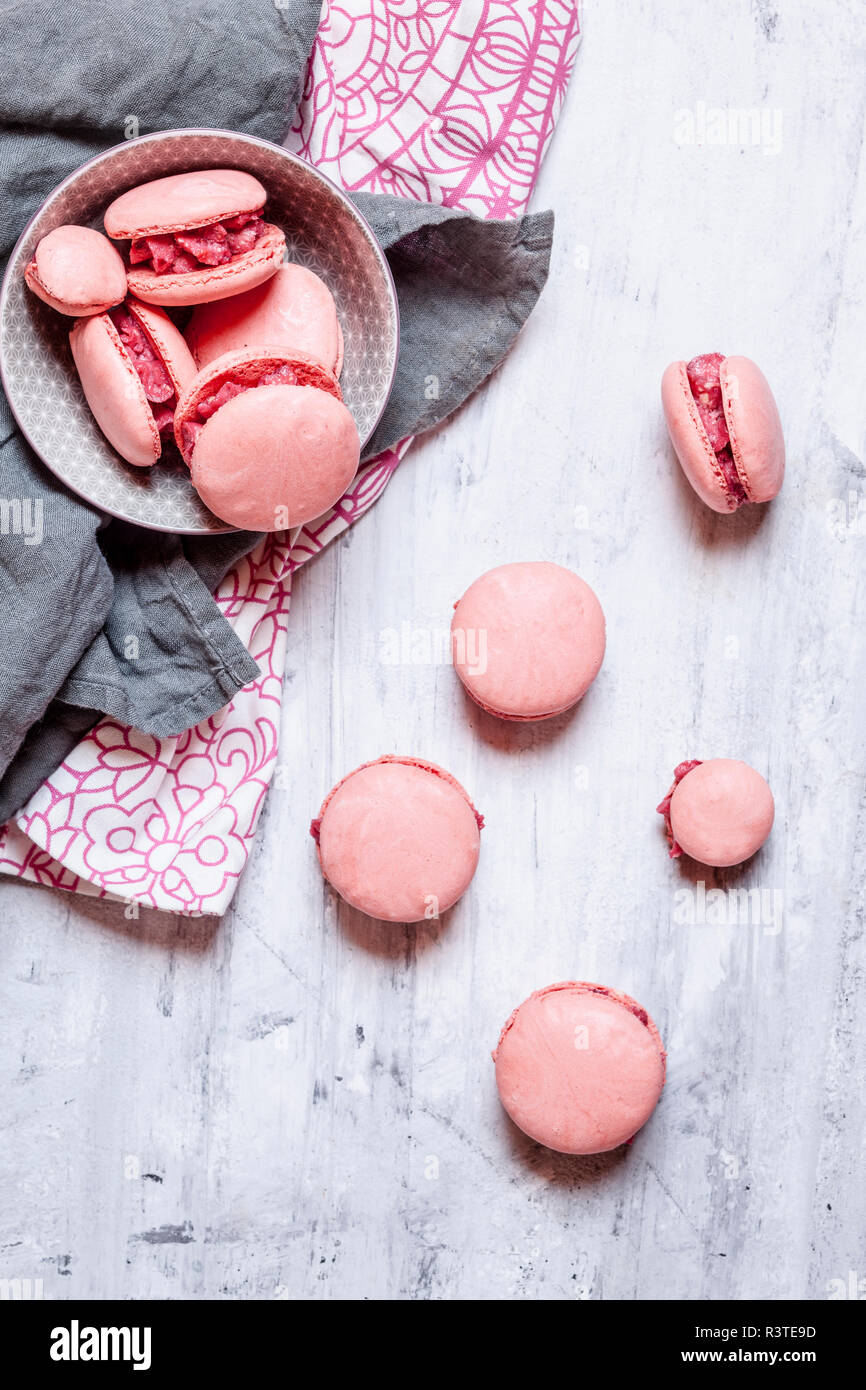 Pink macarons filled with raspberry buttercream Stock Photo - Alamy