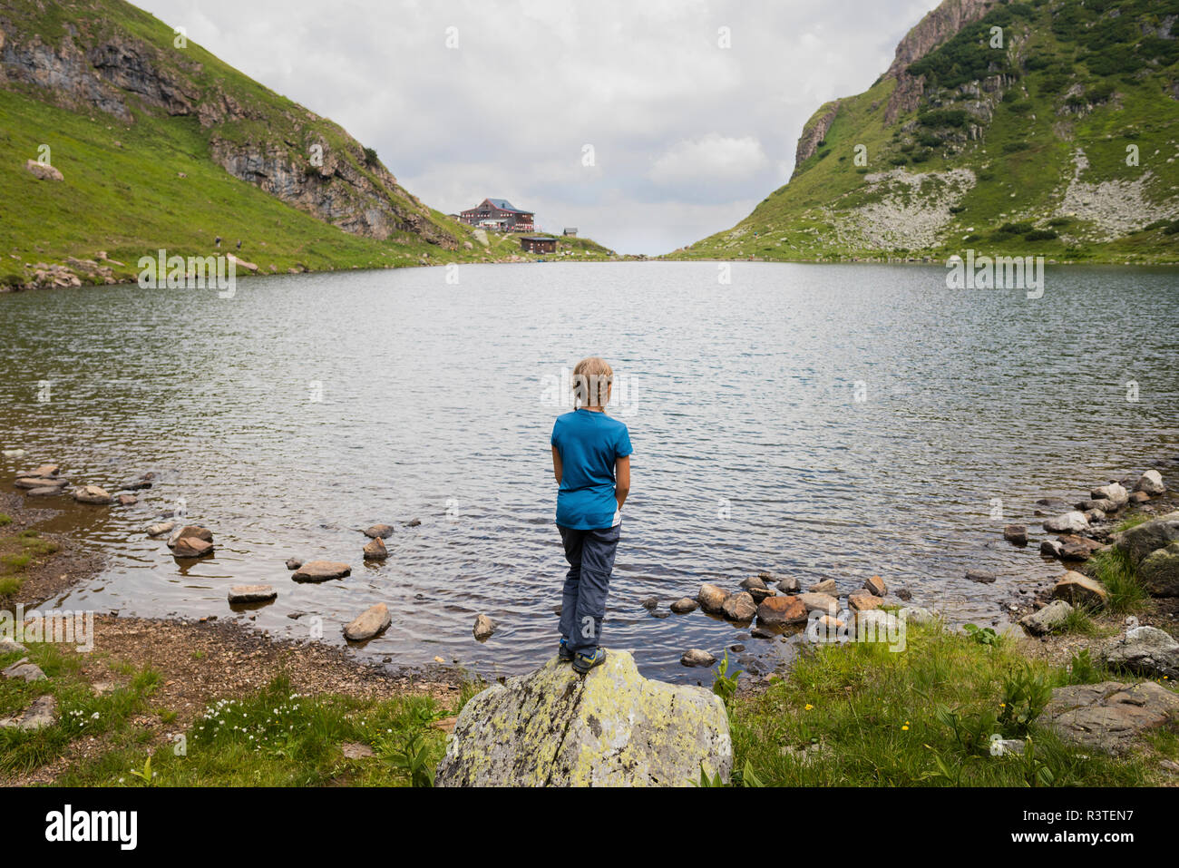 Girl standing shore lake wildsee hi-res stock photography and images ...