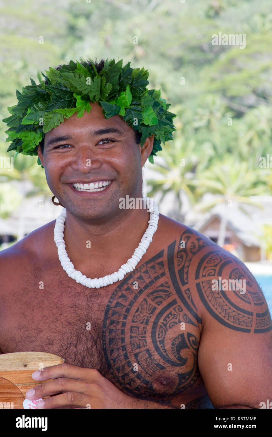 Man with typical island tattoos. Bora Bora, French Polynesia Stock Photo -  Alamy