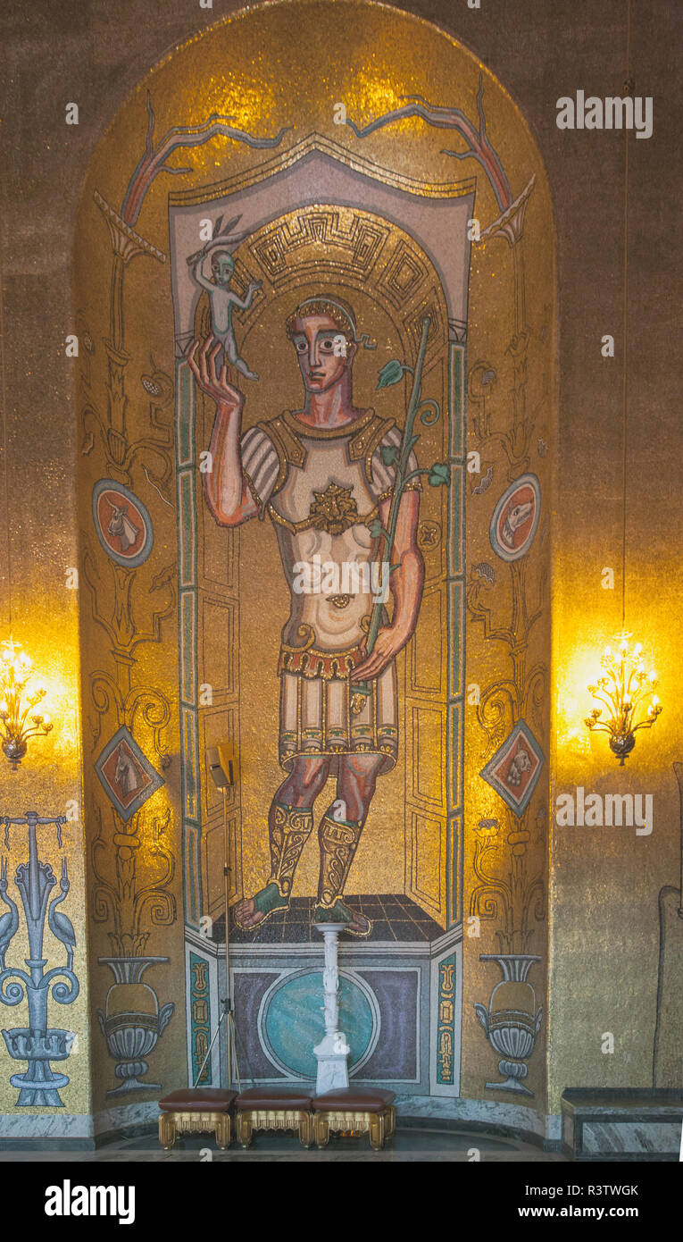 One of the many gold leaf mosaics found in the niches of the side walls in the Gold Room in the Stadshuset, or City Hall of Stockholm Stock Photo