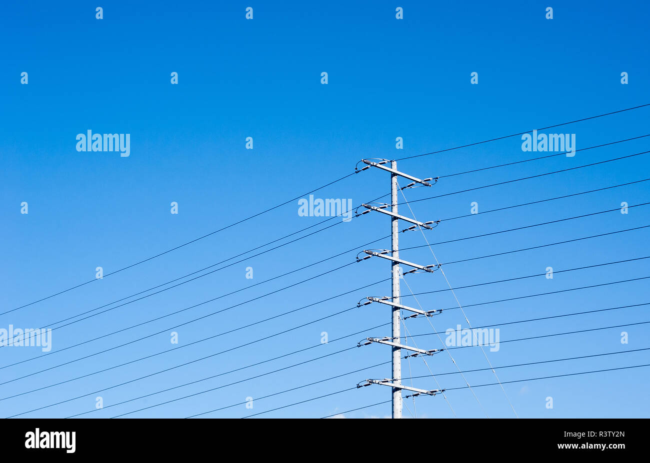 Electrical tower on blue sky with many power lines Stock Photo - Alamy
