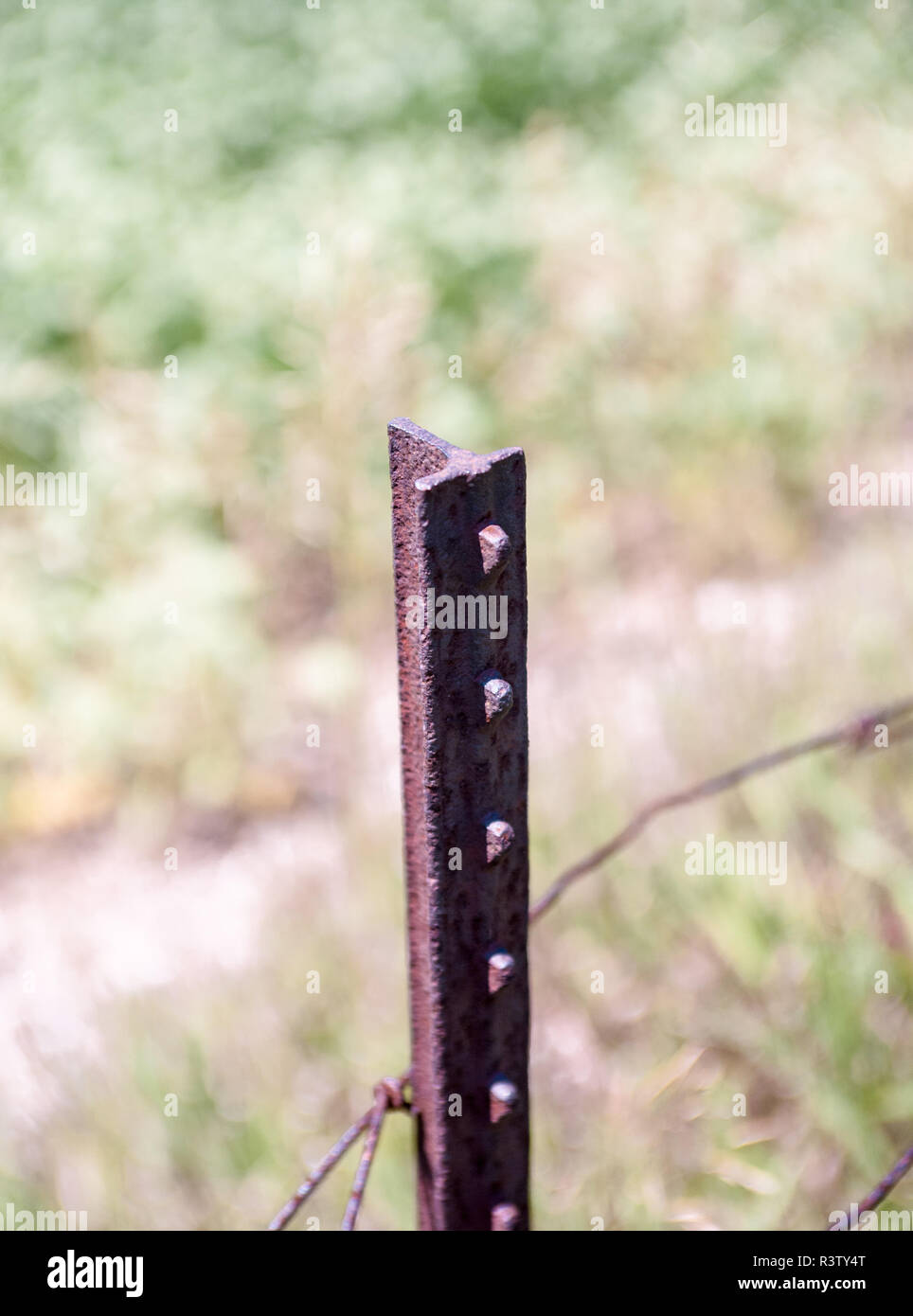 Single old rusted vertical metal bar Stock Photo - Alamy