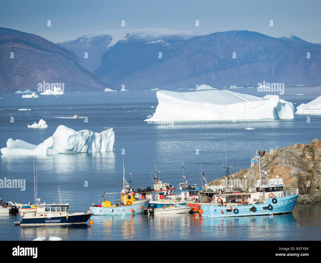 Harbor with typical fishing boats. Small town of Uummannaq in northwest Greenland, Denmark (Editorial Use Only) Stock Photo