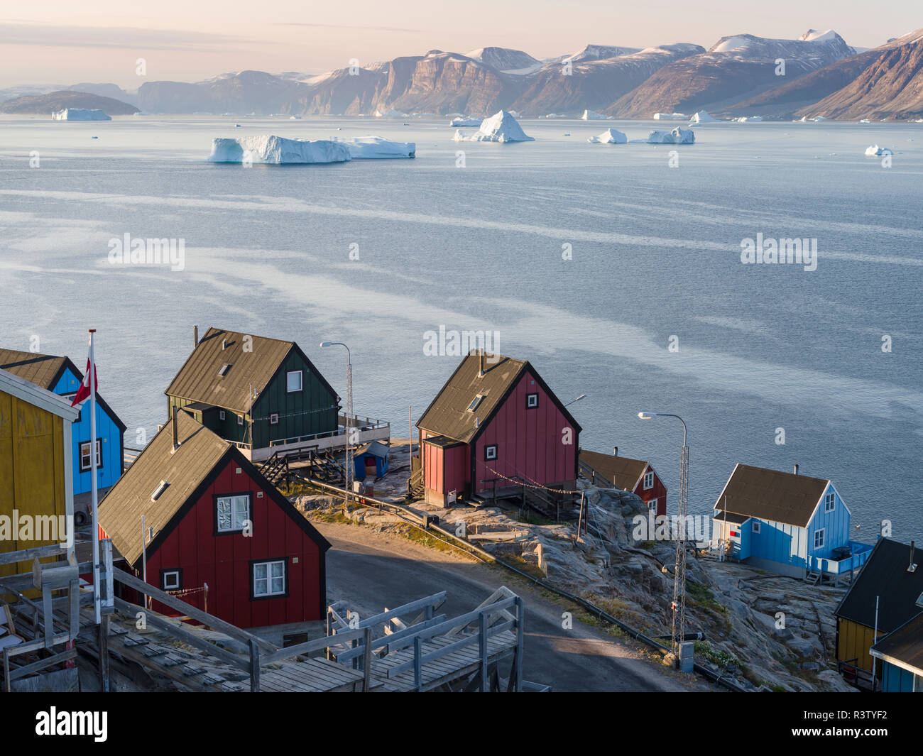 Small town of Uummannaq and glaciated Nuussuaq Peninsula in the background. Greenland, Denmark Stock Photo
