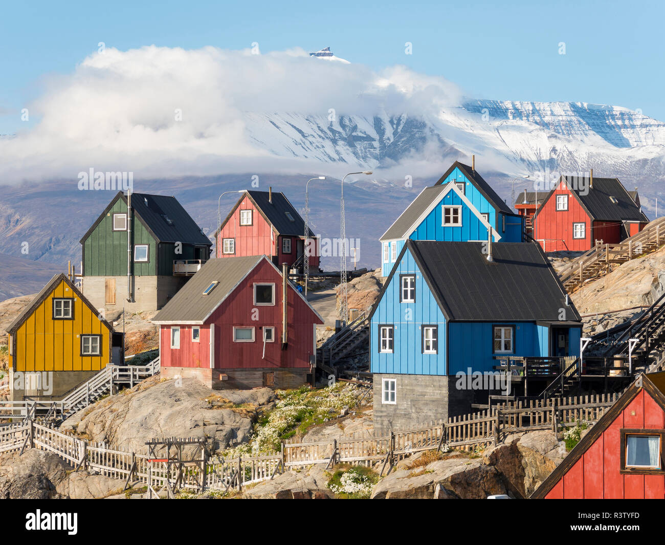 Small town of Uummannaq and glaciated Nuussuaq Peninsula in the background. Greenland, Denmark Stock Photo