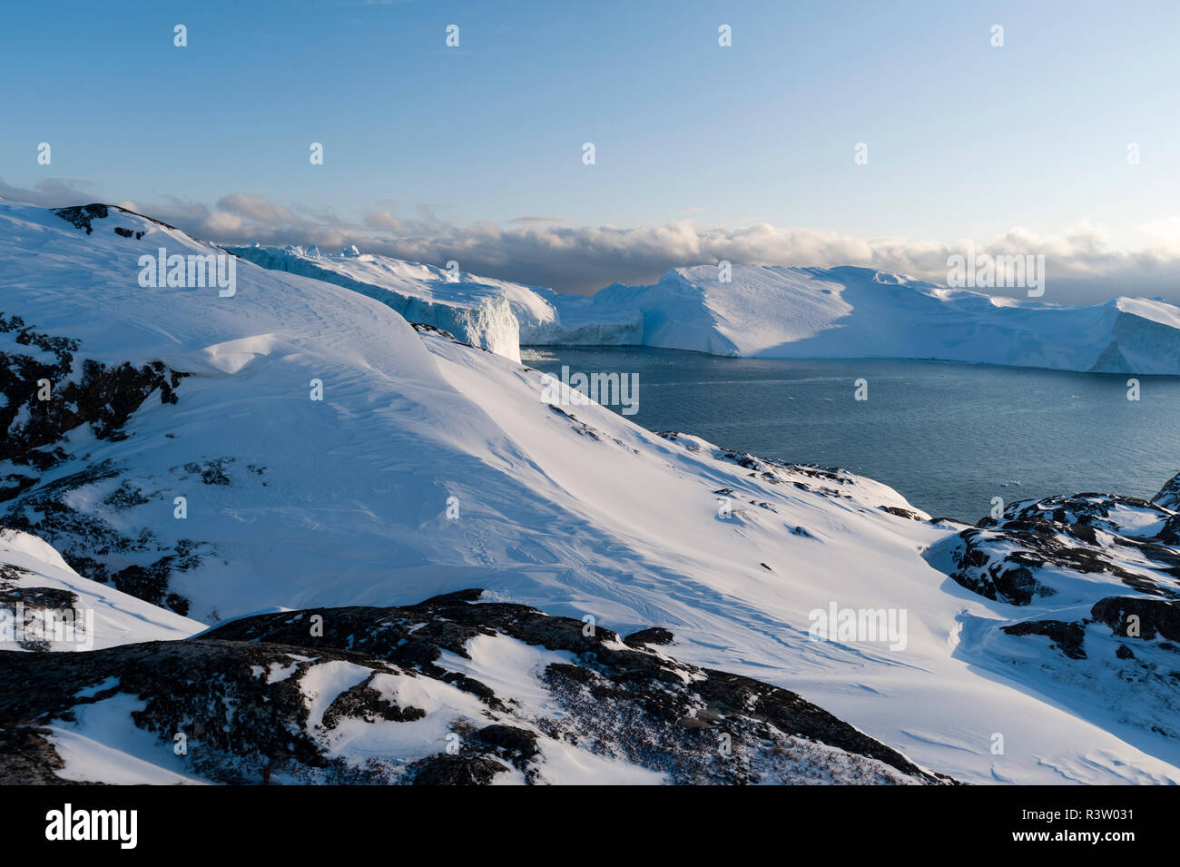 View Of Ilulissat Icefjord UNESCO World Heritage Site Greenland Stock view-of-ilulissat-icefjord-unesco-world-heritage-site-greenland-stock