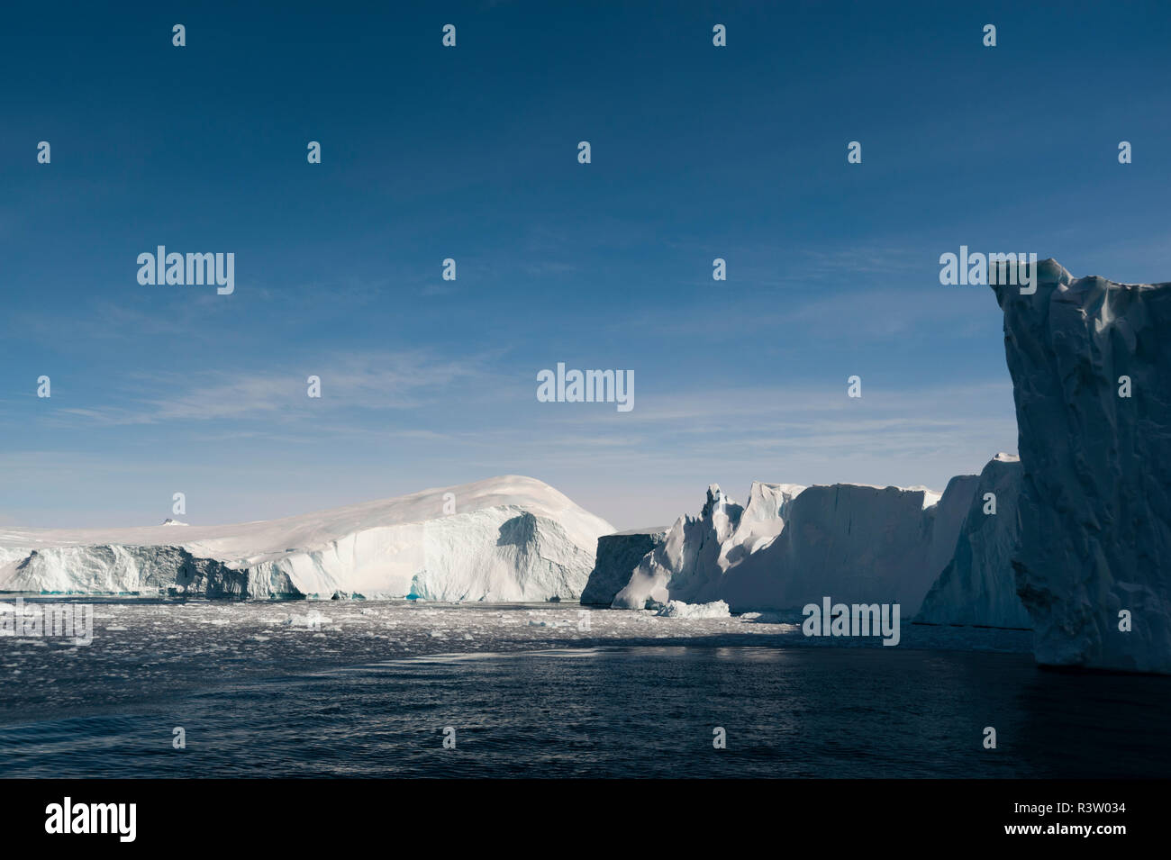 Icebergs In Ilulissat Icefjord UNESCO World Heritage Site Stock Photo icebergs-in-ilulissat-icefjord-unesco-world-heritage-site-stock-photo