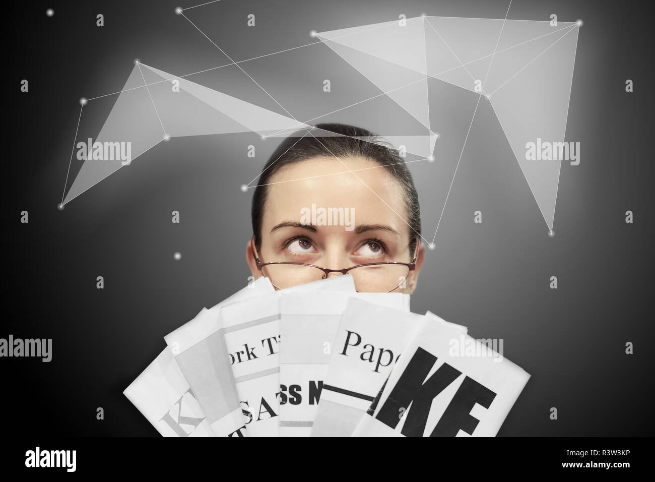 Confusing Headlines Young confused business woman in glasses holding newspapers with ...