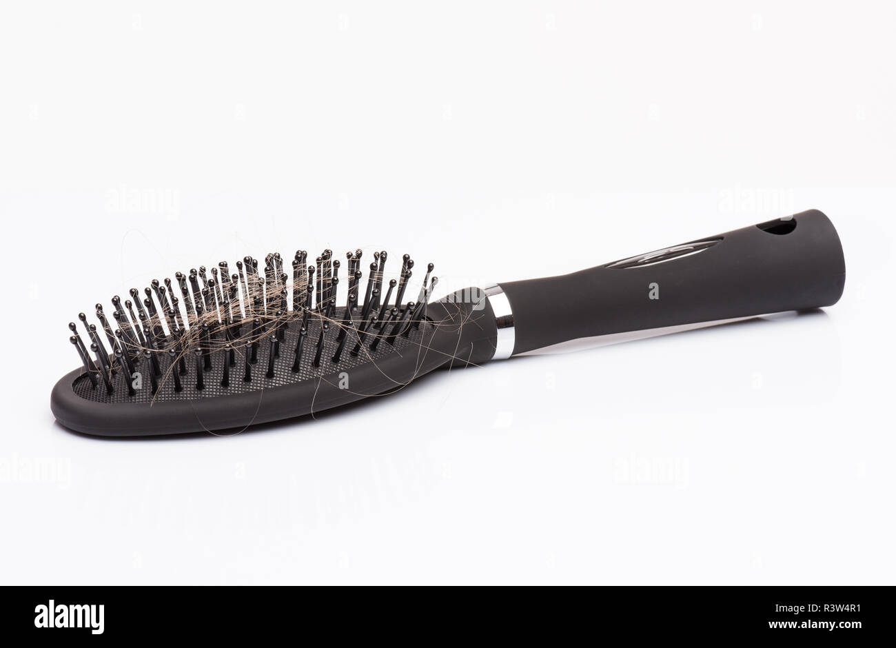 Hair comb brush on white Stock Photo Alamy