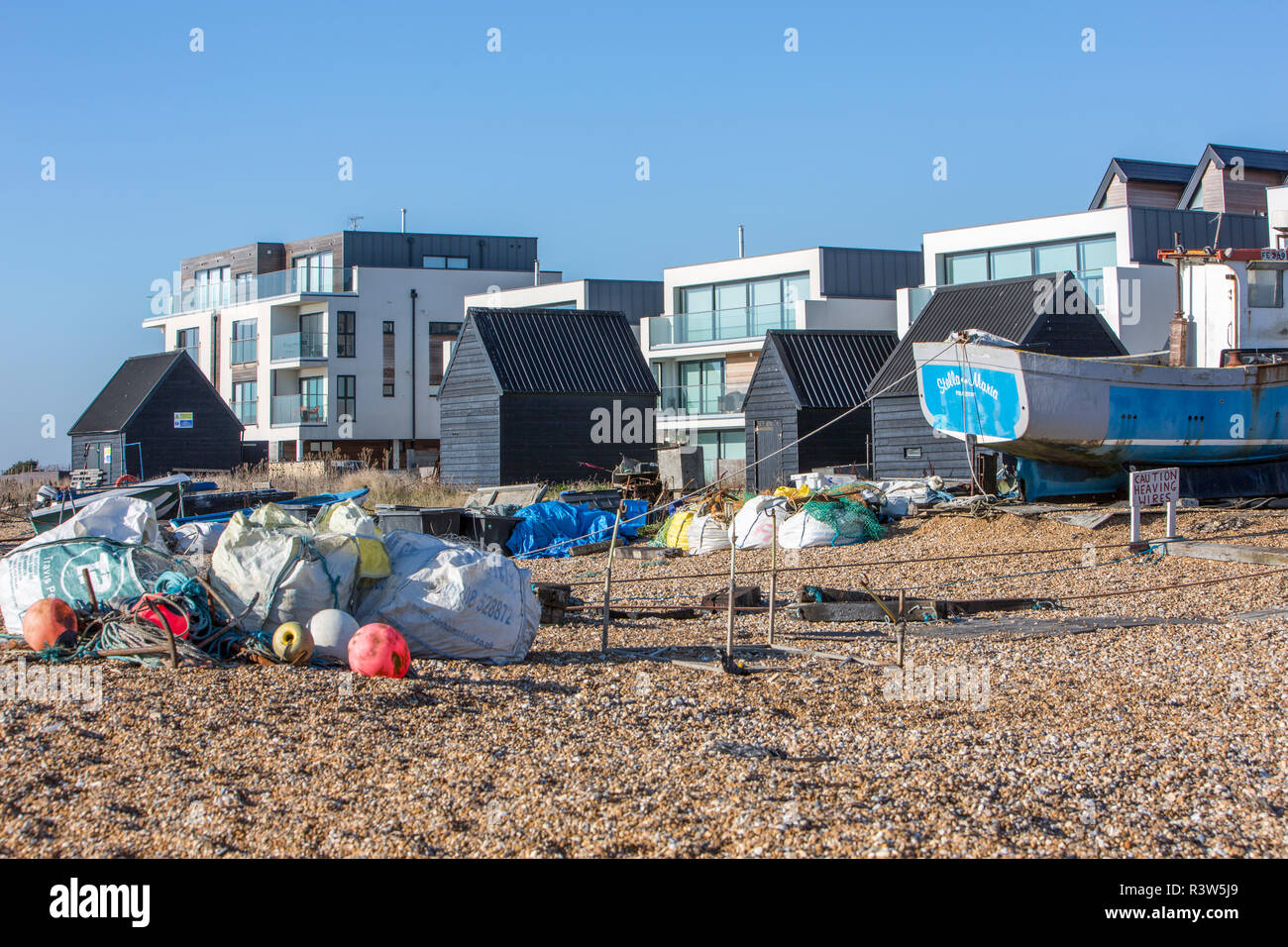 New apartments on a working fisherman's beach Stock Photo Alamy