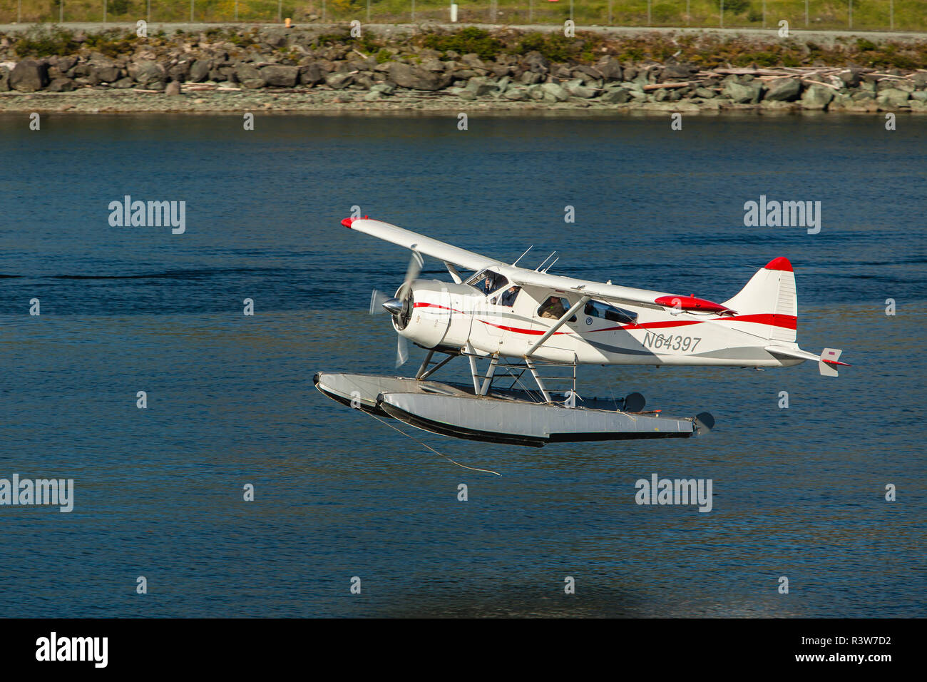 USA, Alaska, Ketchikan. Floatplane takeoff Stock Photo