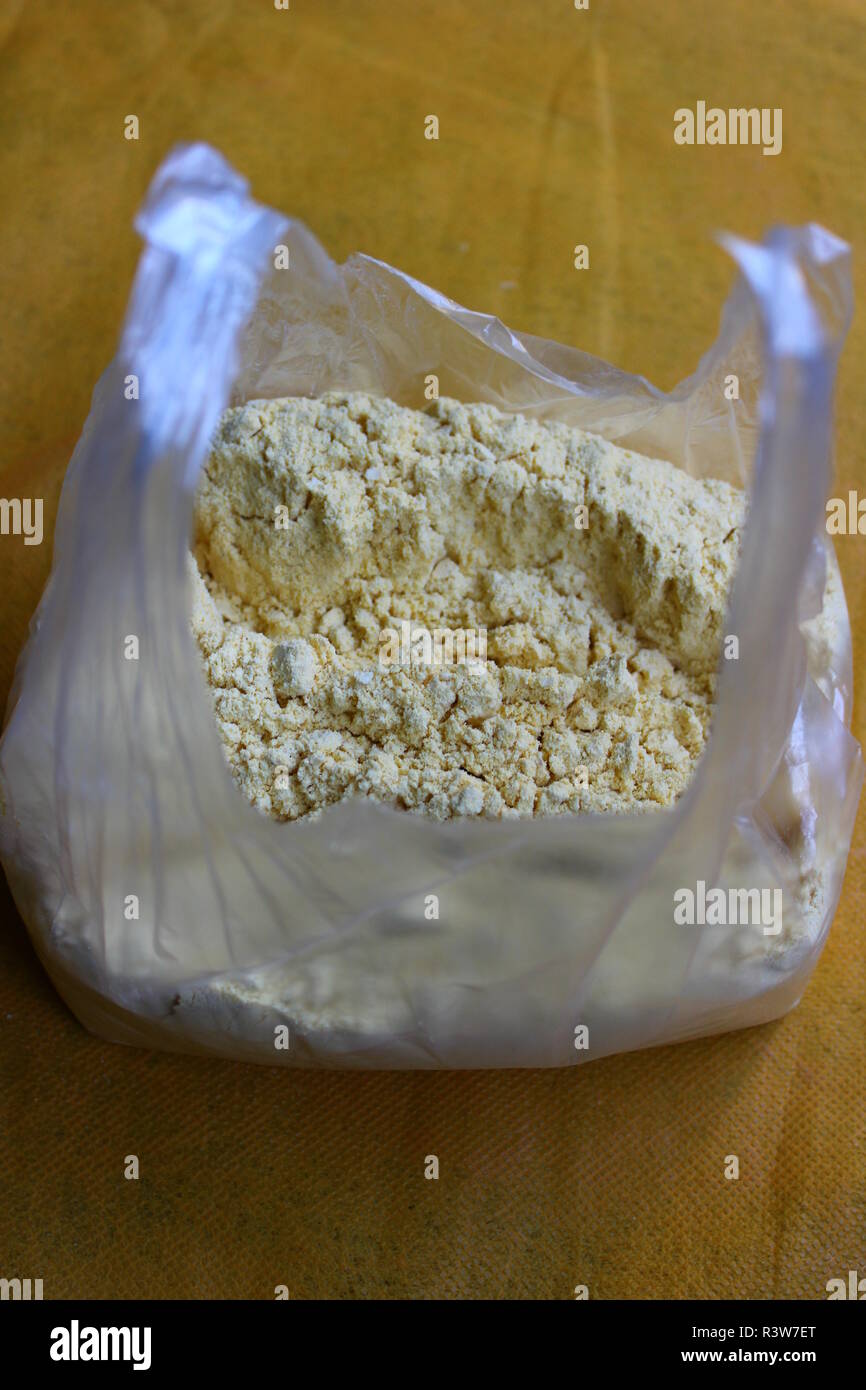 Corn flour in polythene bag Stock Photo