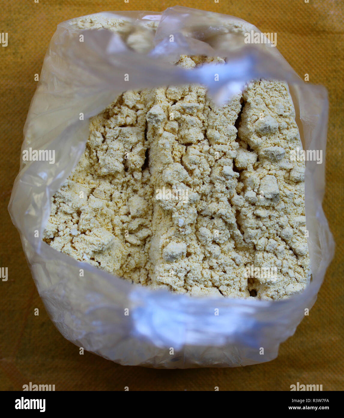 Corn flour in polythene bag Stock Photo