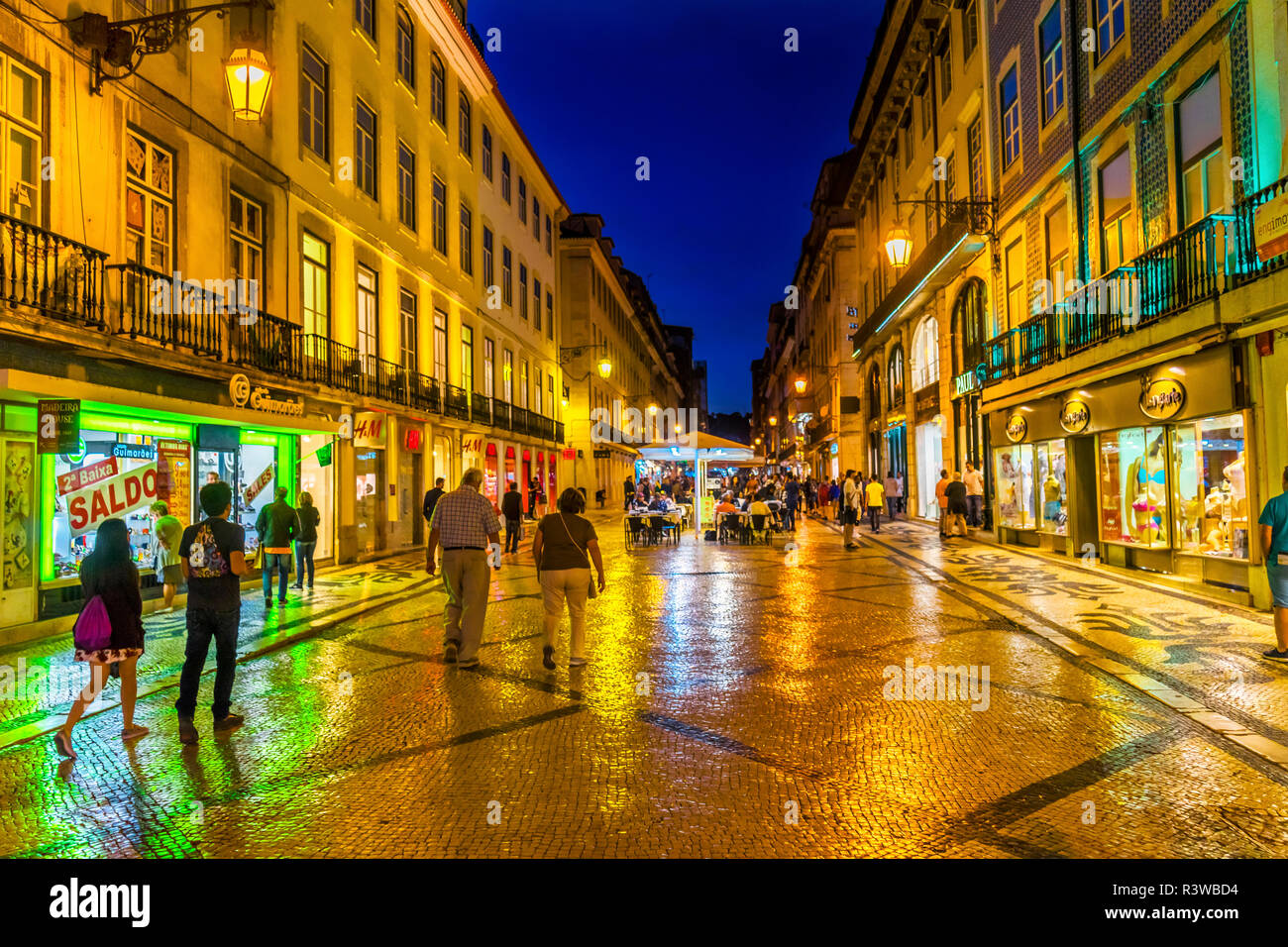 Rua Augusta, shops and restaurants, street with black and white tiles, Baixa, Lisbon, Portugal. Stock Photo