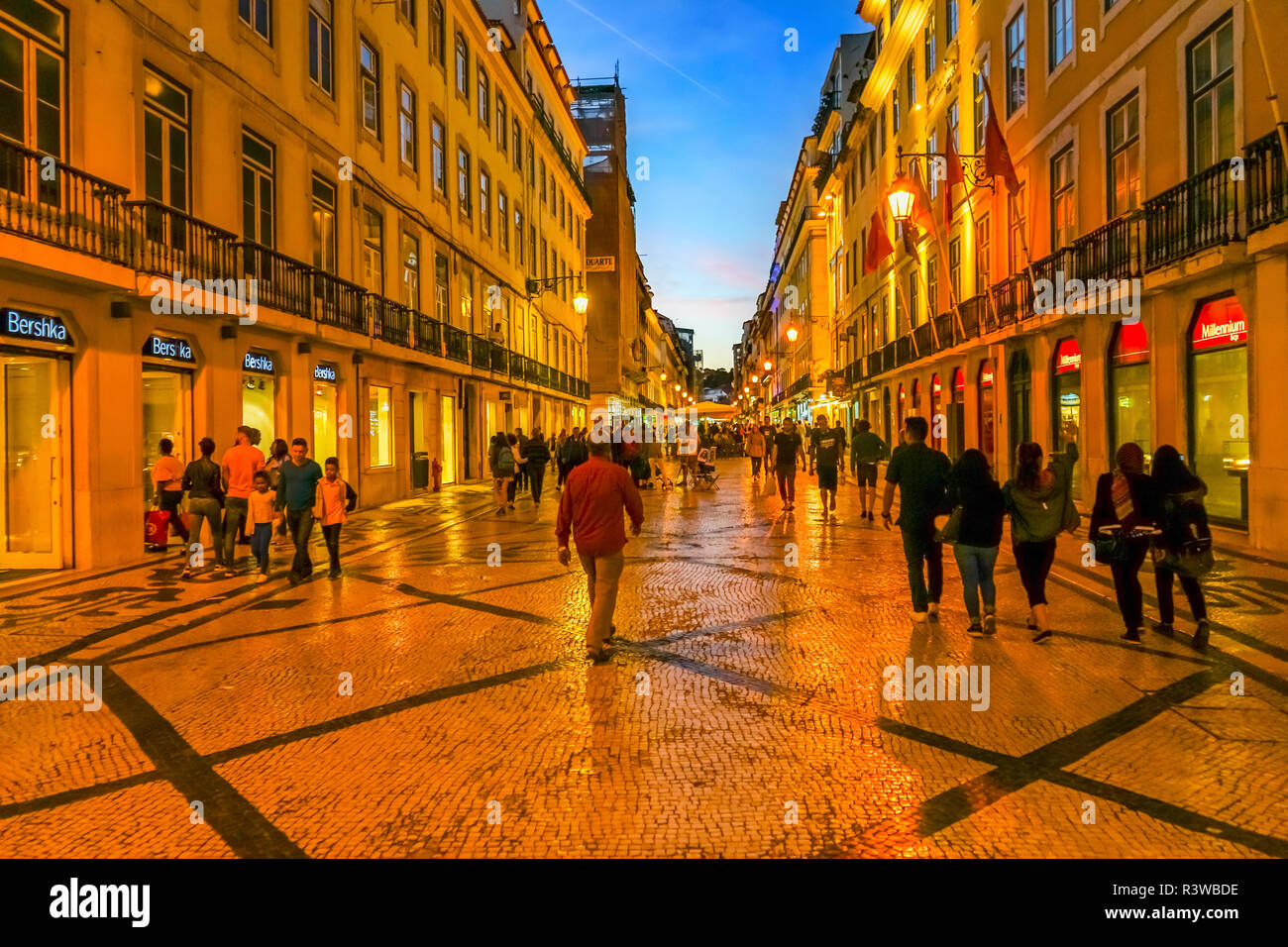 Rua Augusta, shops and restaurants, street with black and white tiles, Baixa, Lisbon, Portugal. Stock Photo