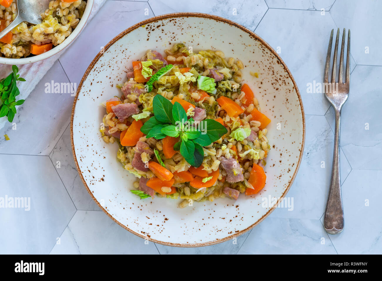 Pearl barley and bacon cassarole with carrots, leek and savoy cabbage