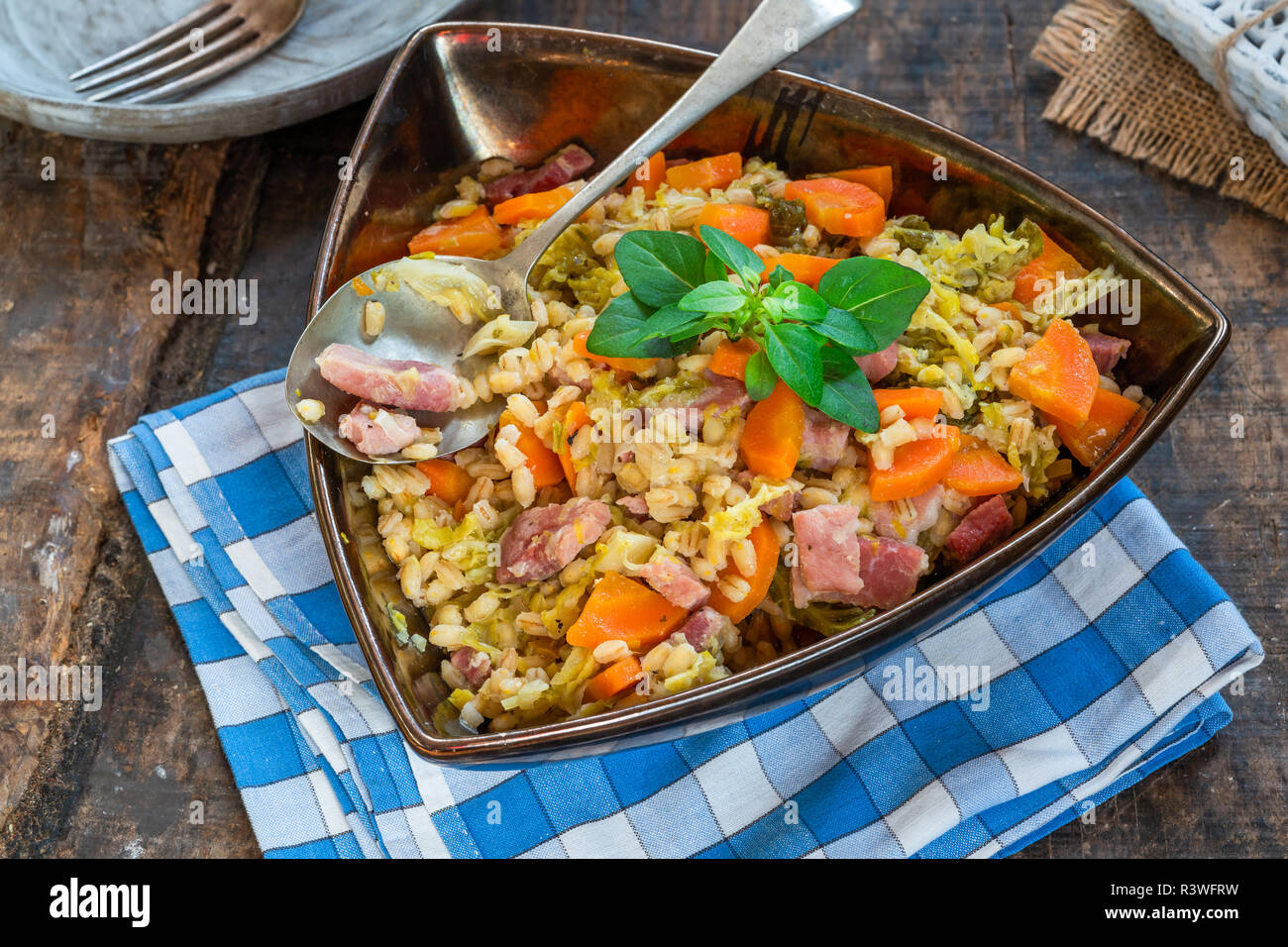Pearl barley and bacon cassarole with carrots, leek and savoy cabbage