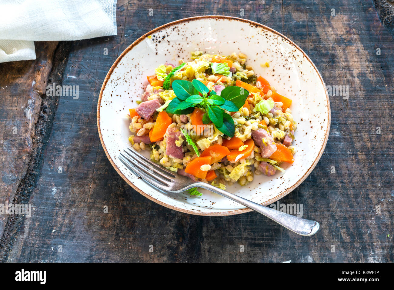 Pearl barley and bacon cassarole with carrots, leek and savoy cabbage